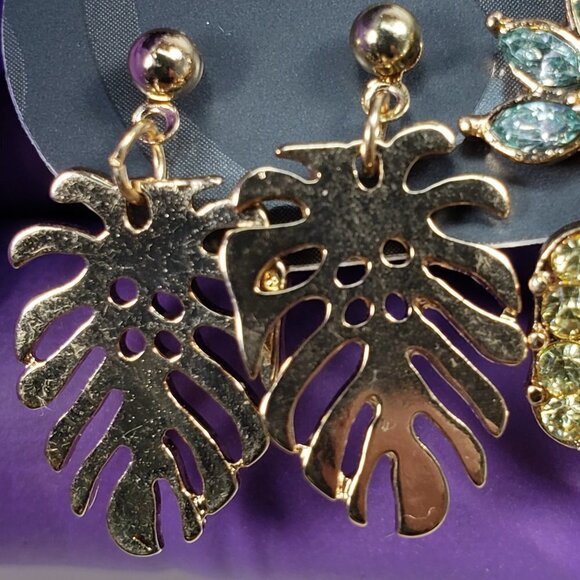Minicci 3 Pairs of Gold-Tone Crystal Post Drop Earrings, Flamingo, Leaf, Flower - Picture 10 of 11